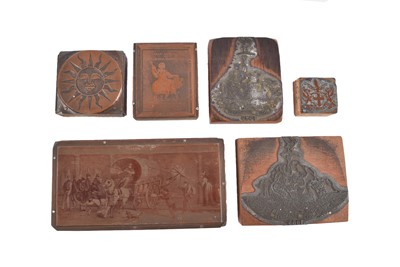 Lot 339 - Six printing plates mounted o wooden blocks