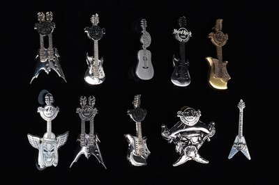 Lot 7 - A collection of ten chrome Hard Rock Café Cayman Islands pin badges