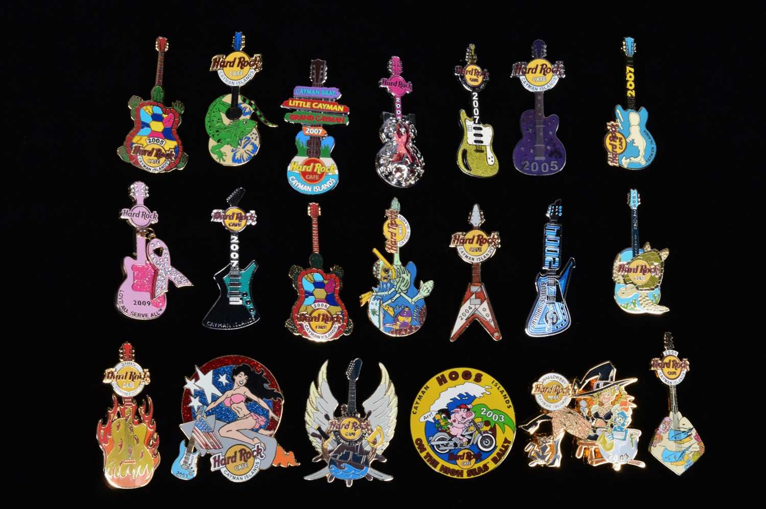 Lot 9 - A collection of twenty dated Hard Rock Café Cayman Islands pin badges