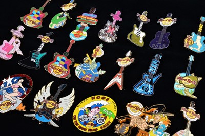 Lot 9 - A collection of twenty dated Hard Rock Café Cayman Islands pin badges