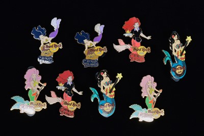 Lot 12 - A collection of eight Mermaid Hard Rock Café Cayman Islands pin badges