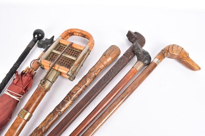 Lot 22 - A collection of five walking sticks
