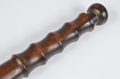 Lot 39 - A 20th Century two tone police truncheon