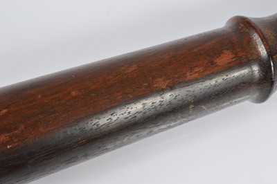 Lot 39 - A 20th Century two tone police truncheon