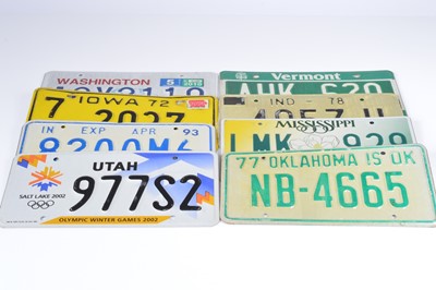 Lot 84 - A collection of eight vintage licence plates form various U.S states