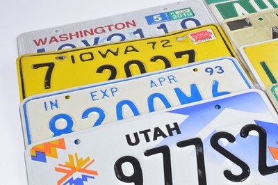 Lot 84 - A collection of eight vintage licence plates form various U.S states
