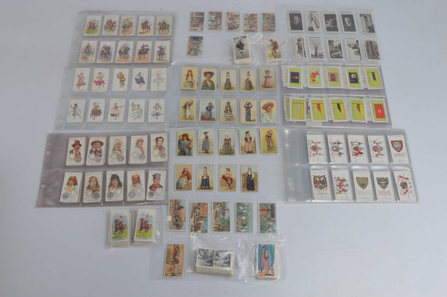Lot 187 - People of The World Themed Cigarette Card Sets and Part Set, (16)