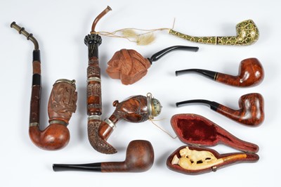 Lot 230 - A collection of unusual smoking pipes