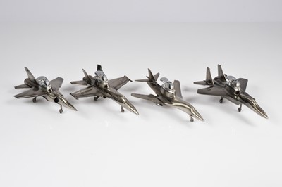 Lot 232 - A collection of four novelty fighter jet table lighters