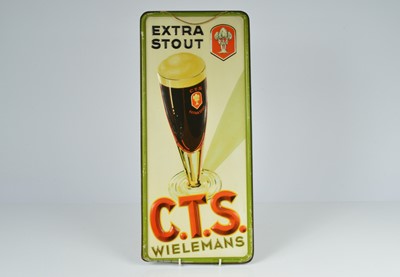 Lot 255 - A vintage C.T.S. Wielemans Extra Stout advertising sign