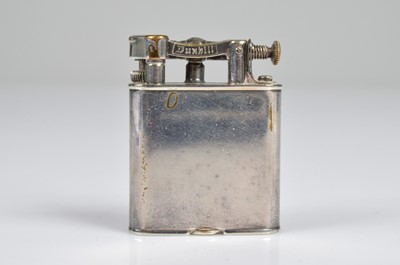 Lot 274 - A Dunhill Unique silver plated petrol pocket lighter