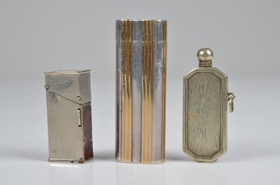 Lot 282 - A Cartier Ovale bi-metal pocket lighter
