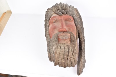 Lot 319 - A large wooden carving of an African Male
