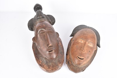 Lot 321 - Two carved wooden African Baule Masks