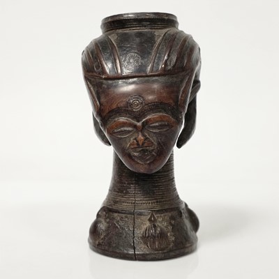Lot 329 - A collection of African carved items