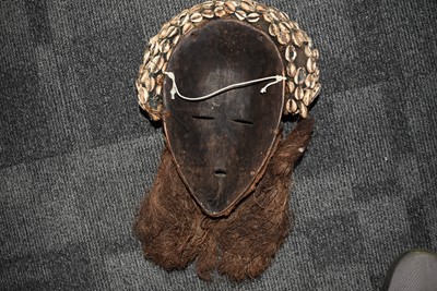Lot 329 - A collection of African carved items