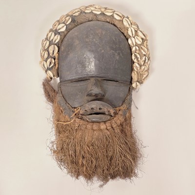 Lot 329 - A collection of African carved items