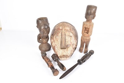 Lot 330 - An African carved wooden Textile printing tool