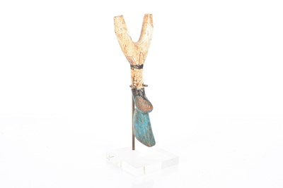 Lot 332 - An African carved wooden sling shot
