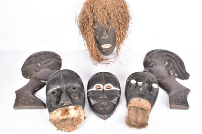 Lot 335 - A collection of African Masks