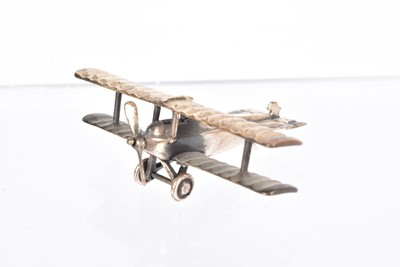 Lot 406 - A miniature silver figure of a Hansa-Brandenburg Biplane