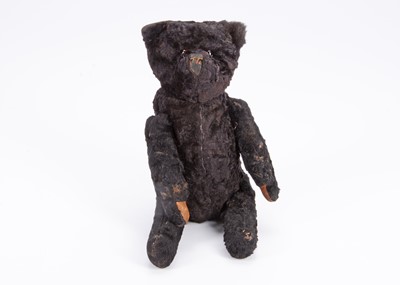 Lot 69 - An interest black teddy bear, circa 1915 -20