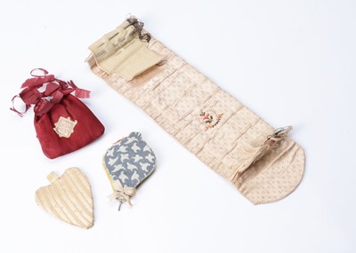 Lot 355 - A small silk sewing roll, probably early 19th century