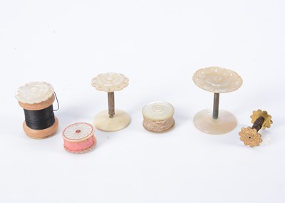 Lot 357 - Three 19th century mother of pearl cotton holders