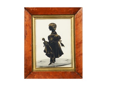 Lot 374 - A mid 19th century silhouette of a girl with her doll