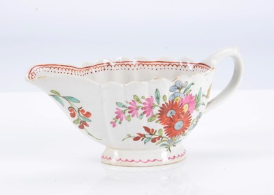 Lot 376 - A Bow porcelain fluted sauce boat, circa 1765
