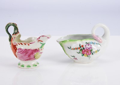 Lot 377 - A Derby porcelain lettuce moulded cream boat, circa 1760