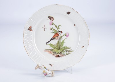 Lot 380 - A Meissen plate painted with a goldfinch on a thistle, 1740s