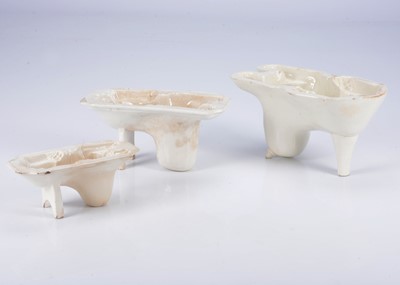Lot 383 - Three graduated English creamware lion aspic moulds, 1830s