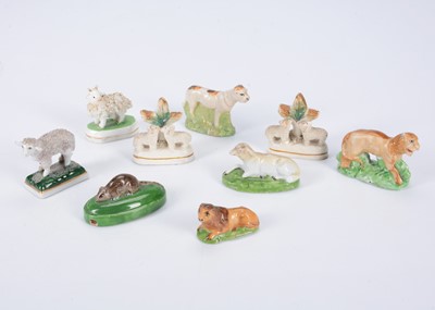 Lot 385 - A pair of Staffordshire miniature sheep