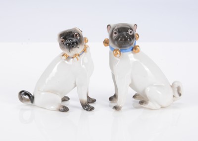 Lot 400 - Two late 19th century German porcelain pug dogs