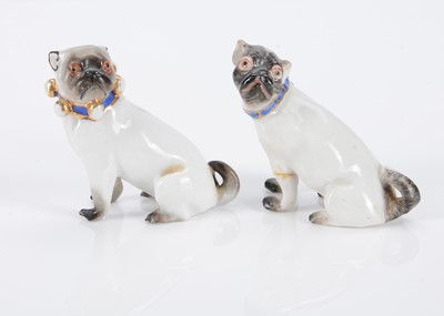 Lot 401 - Two German porcelain pug dogs, circa 1900