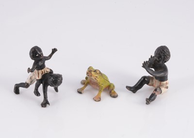 Lot 413 - Three Viennese cold painted bronze black children