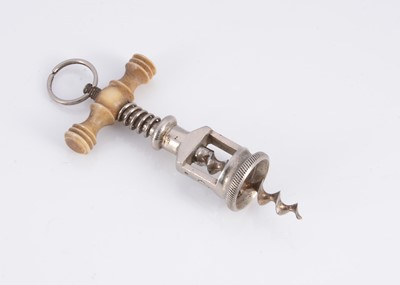 Lot 418 - A rare lady’s perfume bottle corkscrew