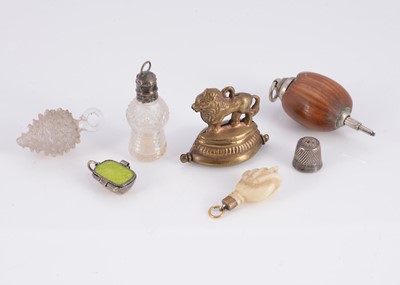 Lot 424 - A white metal propelling pencil in a hazelnut
