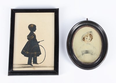 Lot 434 - An early 19th century silhouette of a young boy