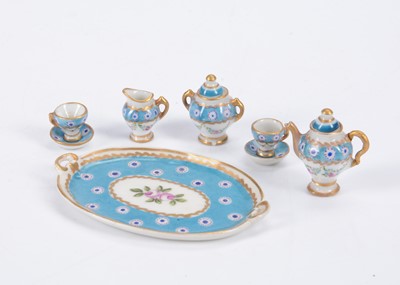 Lot 582 - A Limoges porcelain dolls’ house tea coffee set for two