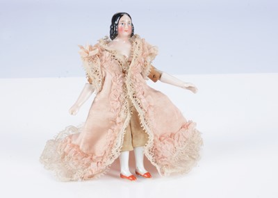 Lot 586 - A rare Kister china shoulder-head dolls’ house doll.