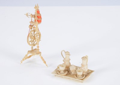 Lot 589 - A 19th century bone dolls’ house spinning wheel