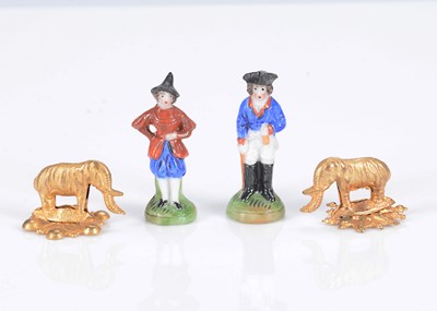 Lot 593 - A pair of German porcelain dolls’ house figures, circa 1900