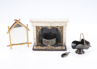 Lot 597 - An 19th century dolls’ house fireplace