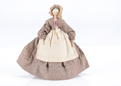 Lot 598 - An 19th century Grodnertal carved wooden dolls’ house doll