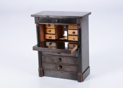 Lot 604 - An 19th century Waltershausen dolls’ house drop front bureau