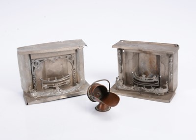Lot 611 - A pair of 19th century tinplate dolls’ house fireplaces