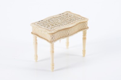 Lot 613 - An 19th century bone dolls’ house sewing table