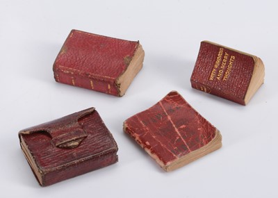 Lot 620 - Four miniature books